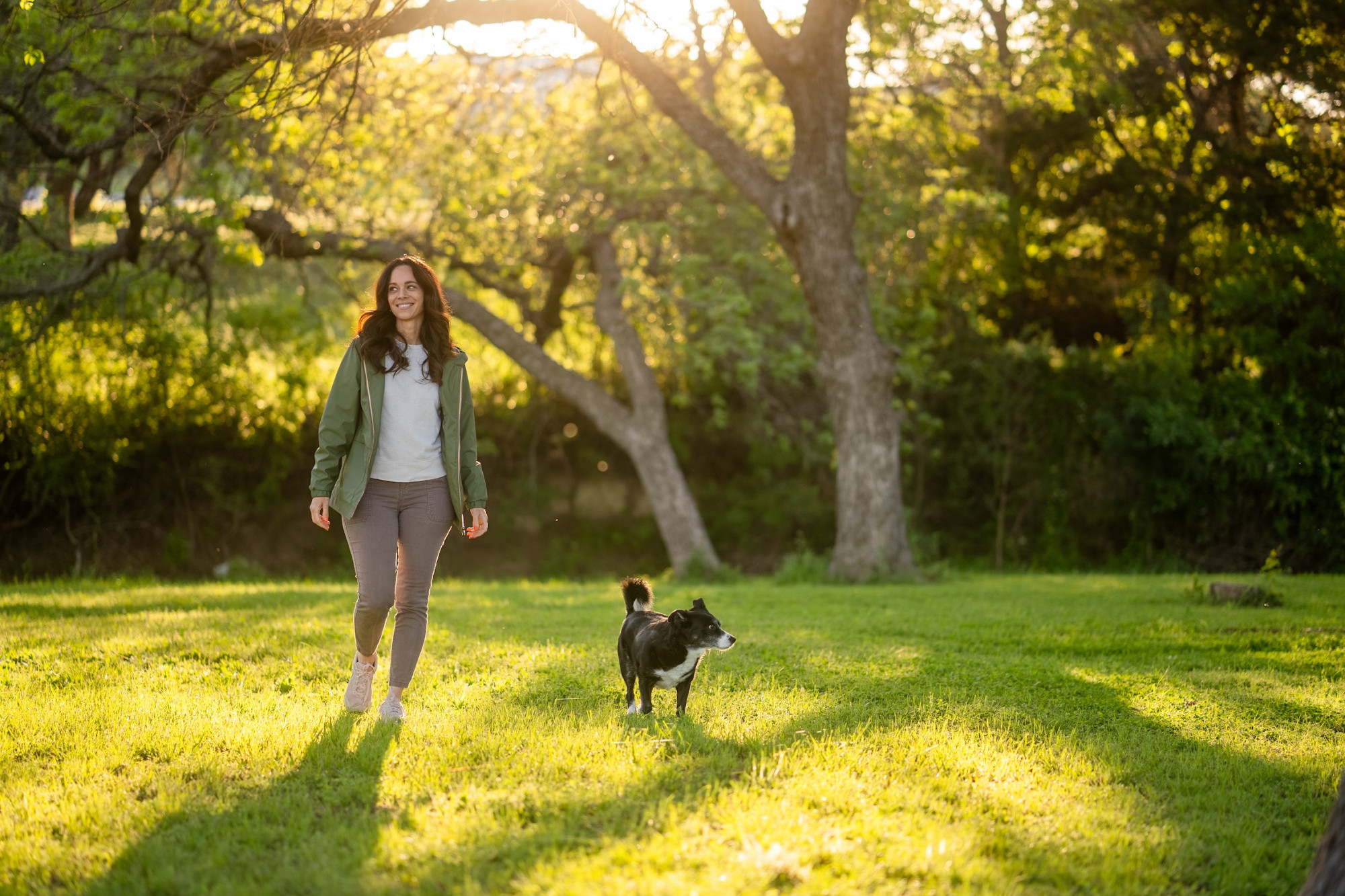 woman and her dog walking in copperas cove park