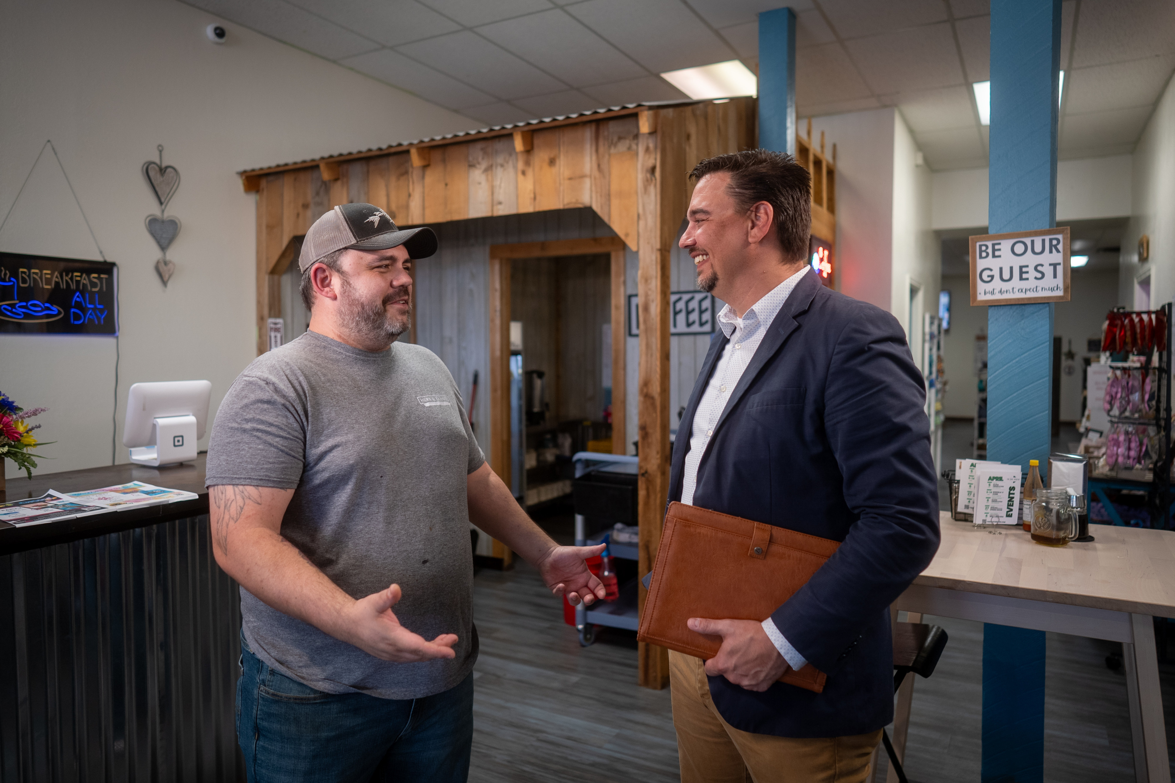 business owner shaking hands with a CCEDC team member